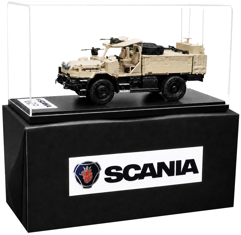 Custom-made model of the Scania VRP military vehicle in a display case, with packaging customized in the client's colors.